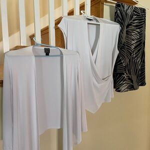 Flowy palazzo pants with white draped polyester, rayon, spandex tops.